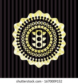 icono de semáforo dentro del emblema dorado