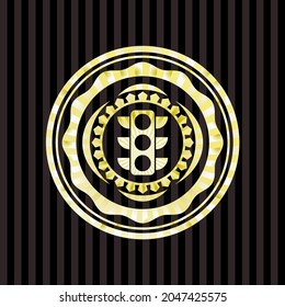 icono del semáforo dentro del emblema dorado. 