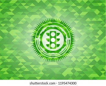 traffic light icon inside green emblem with triangle mosaic background
