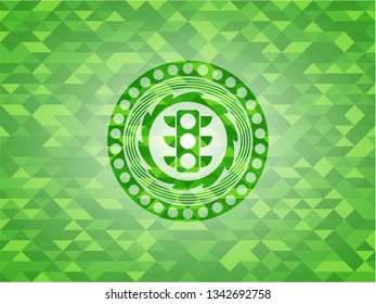 traffic light icon inside green mosaic emblem