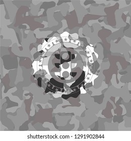 traffic light icon inside grey camo texture