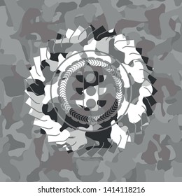 traffic light icon inside grey camo emblem