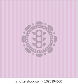 traffic light icon inside pink emblem