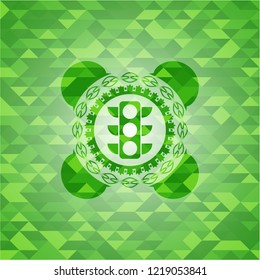 traffic light icon inside realistic green emblem. Mosaic background
