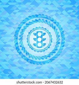 traffic light icon inside realistic sky blue mosaic emblem. 