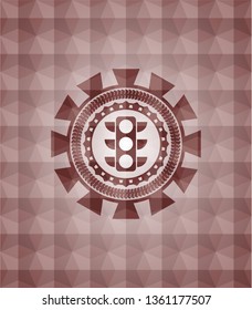 traffic light icon inside red seamless emblem or badge with abstract geometric polygonal pattern background.
