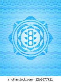 traffic light icon inside water wave concept style badge.