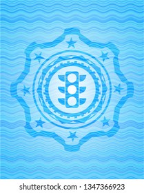 traffic light icon inside water wave style badge.