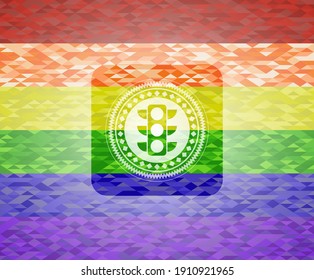 icono del semáforo sobre fondo de mosaico con los colores de la bandera LGBT. 