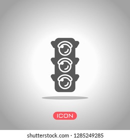 Traffic light icon. Icon under spotlight. Gray background