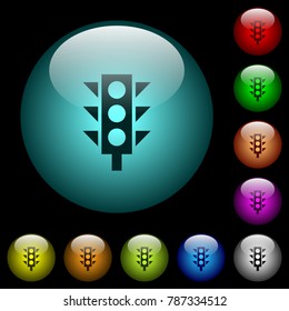 Traffic light icons in color illuminated spherical glass buttons on black background. Can be used to black or dark templates