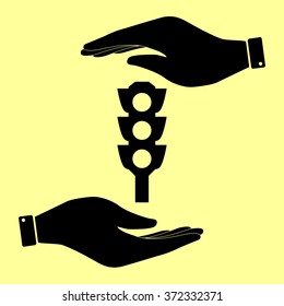 Traffic light sign. Save or protect symbol by hands.