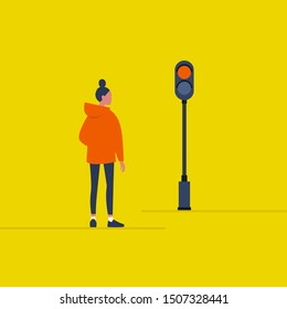 Traffic light. Young female pedestrian waiting on a crosswalk. Safety. Stop signal. Flat editable vector illustration, clip art