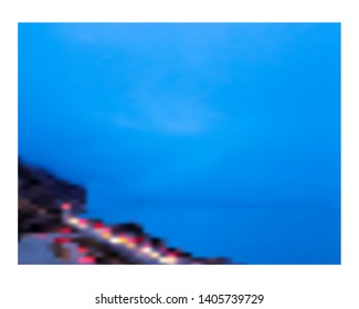 Traffic lights at  dusk on the Seward Highway along Turnagain Arm,  Anchorage Alaska.