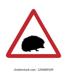 Traffic mark caution hedgehog on white bakground.