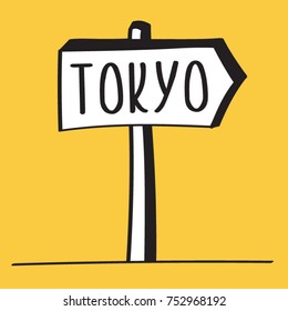 A TRAFFIC SIGN INDICATING DIRECTION TO TOKYO.