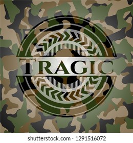 Tragic written on a camouflage texture