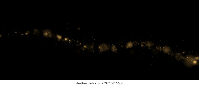 Trail of soft golden bokeh lights scattered diagonally on a black background on transparent background