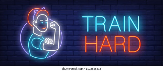 Train hard neon sign. Strong woman touching her biceps on dark brick wall. Vector illustration in neon style for motivational placard or feminism movement