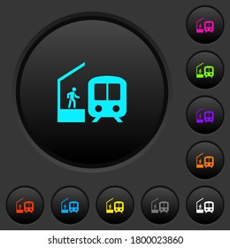 Train station dark push buttons with vivid color icons on dark grey background