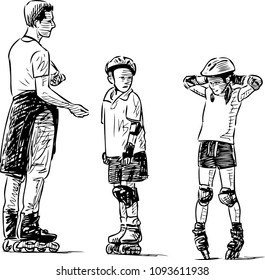 A trainer teaches the kids to skate on rollers