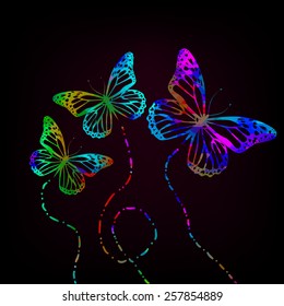 The trajectory of watercolor butterflies on a dark background. Vector