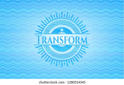 Transform light blue water wave style emblem.