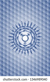 transgender icon inside blue badge with geometric pattern.