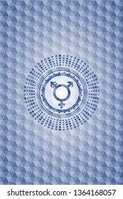 transgender icon inside blue badge with geometric background.