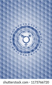 transgender icon inside blue polygonal badge.