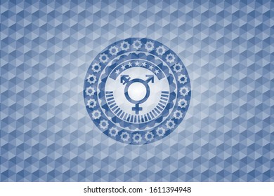 transgender icon inside blue polygonal emblem.