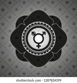 transgender icon inside dark emblem