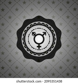transgender icon inside dark emblem. 