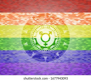 transgender icon inside emblem on mosaic background with the colors of the LGBT flag