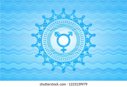 transgender icon inside light blue water badge.