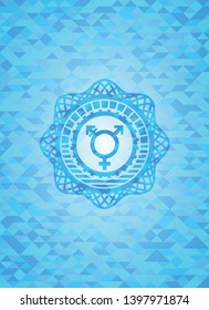 transgender icon inside light blue mosaic emblem