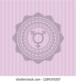 transgender icon inside pink emblem