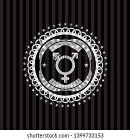 transgender icon inside silver emblem