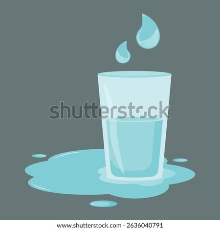 A transparent blue glass filled with water on a muted gray background and small droplets of water hover over the glass, a puddle and scattered drops surround its base.