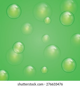 Transparent bubbles on a green background