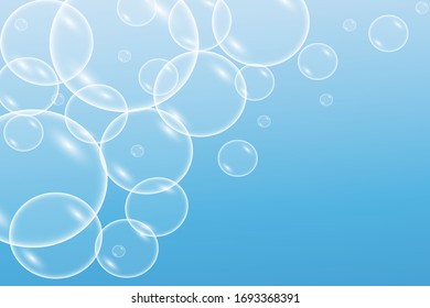 transparent flying bubbles on a blue background