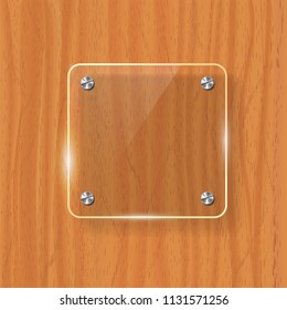 Transparent glass plate mock up. Yellow wooden background. Decorative graphic design element. Plastic glossy panel with reflection, shadow.