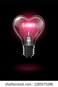 Transparent glowing heart-shaped light bulb on a dark background with the word Love instead of a tungsten filament.