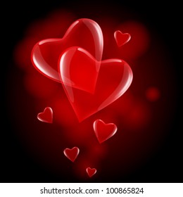 transparent red hearts on abstract dark background