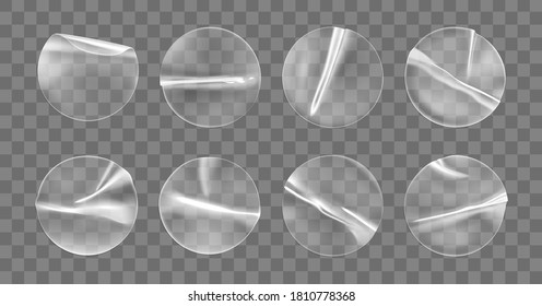 Transparent round adhesive stickers mock up set isolated on transparent background. Plastic crumpled round sticky label with glued effect. Template of a label or price tags. 3d realistic vector mockup