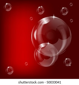 A transparent soap bubble design on a red background  with room for text