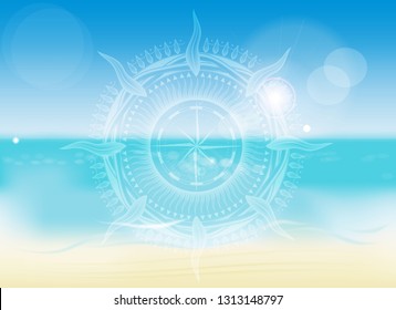 transparent symbol of a nautical compass in the patterns of the background of the summer sea beach
