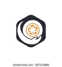 Transport care vector logo design. Tire and hand vector icon.