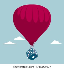 Transport the dice using a hot air balloon. Isolated on blue background.