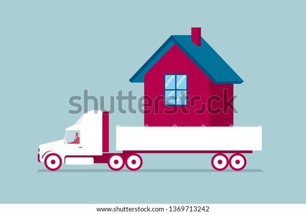 Transport\
the house truck. Isolated on blue\
background.